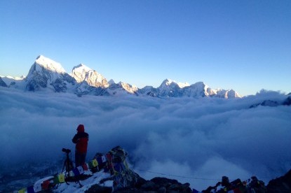 The mountains rises above the cloud, view from Gokyo ri.